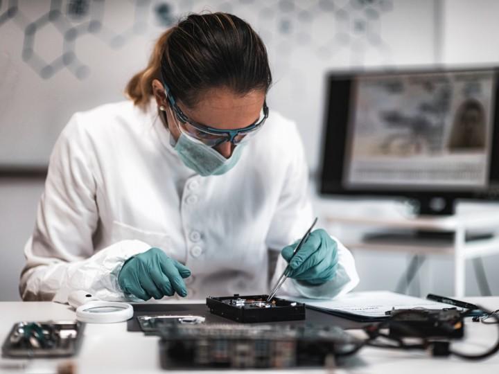 A student examines samples in research lab